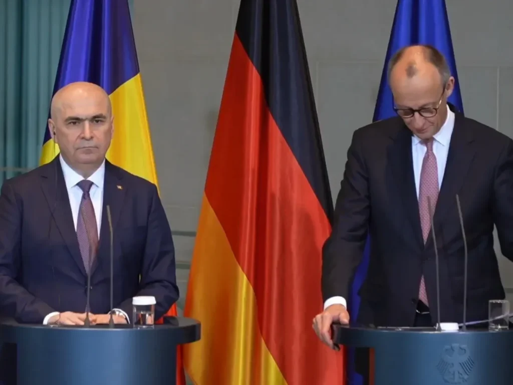 (video)-bolojan,-conferinta-alaturi-de-mertz:-este-o-necesitate-asumarea-unui-rol-mai-mare-al-tarilor-europene-in-bugetele-de-aparare