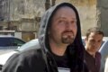 Cheloo, încătușat pe stradă în timpul unei intervenții medicale